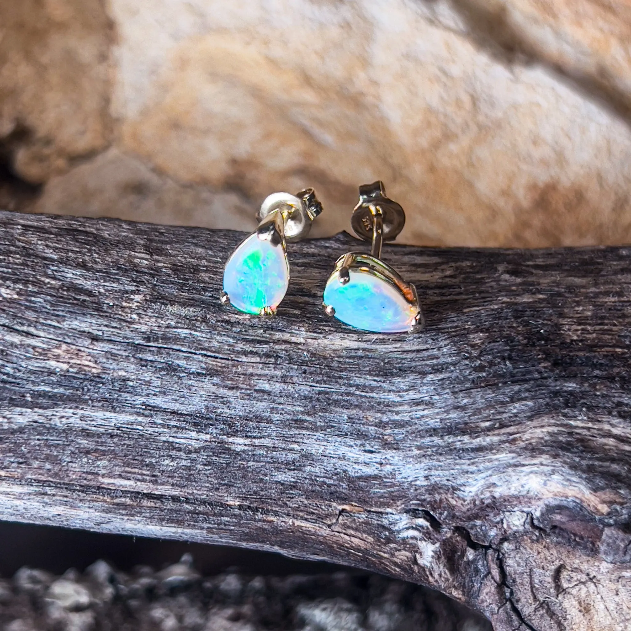 14kt Yellow Gold pear shape Crystal Opals 0.75ct studs