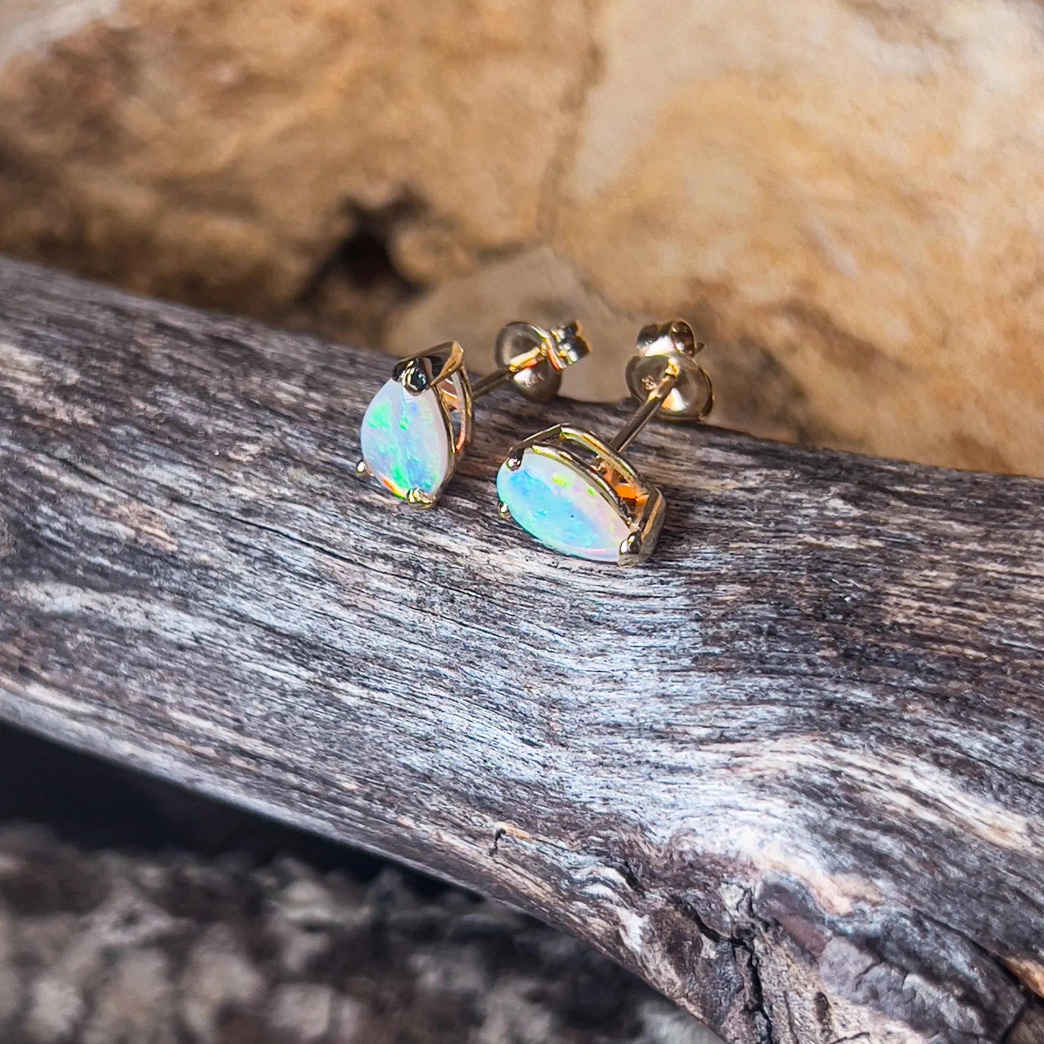 14kt Yellow Gold pear shape Crystal Opals 0.75ct studs