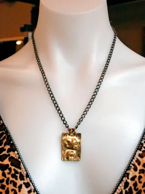 Dennis Higgins Emerging Skulls Pendant Necklace