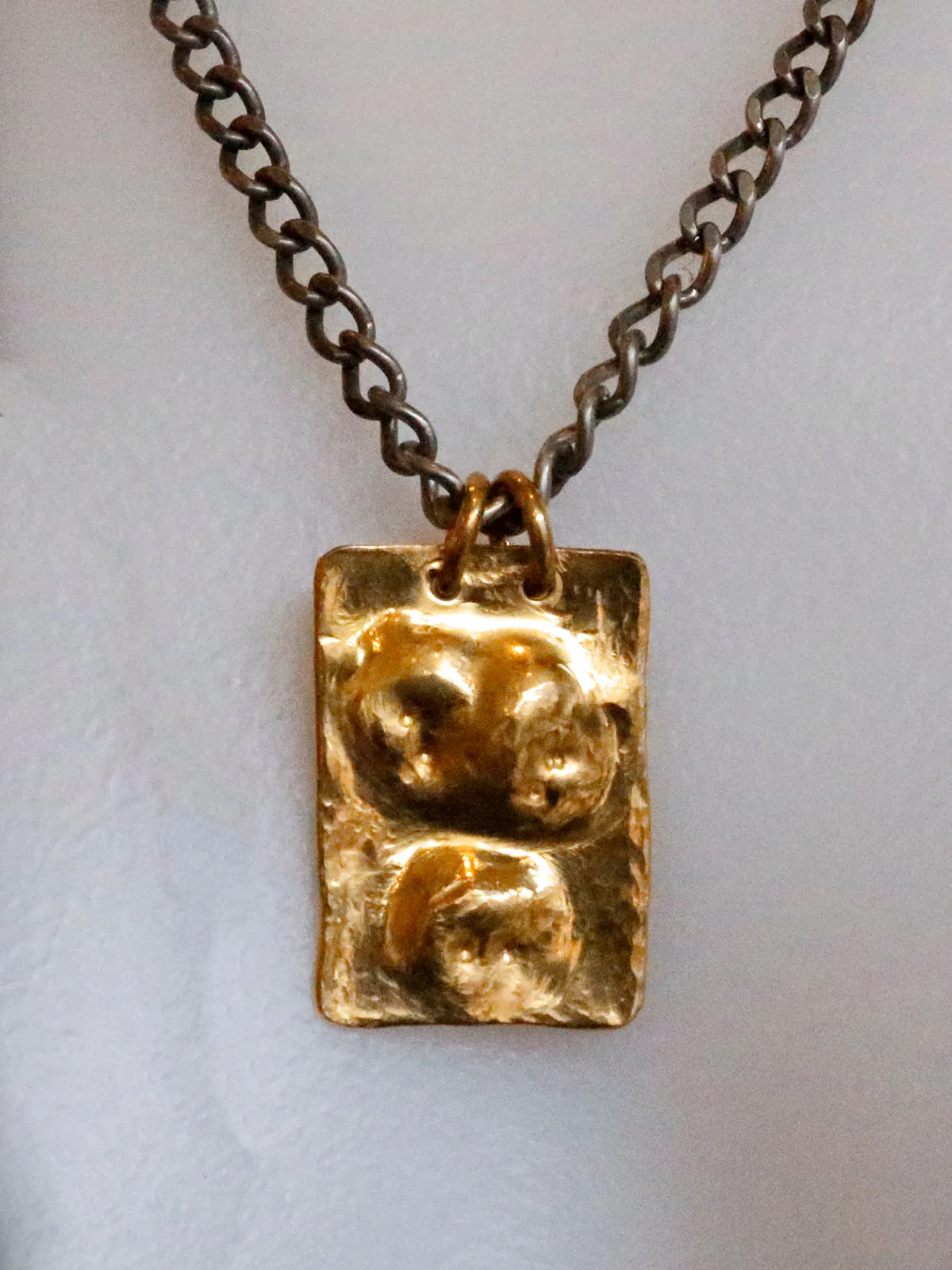 Dennis Higgins Emerging Skulls Pendant Necklace