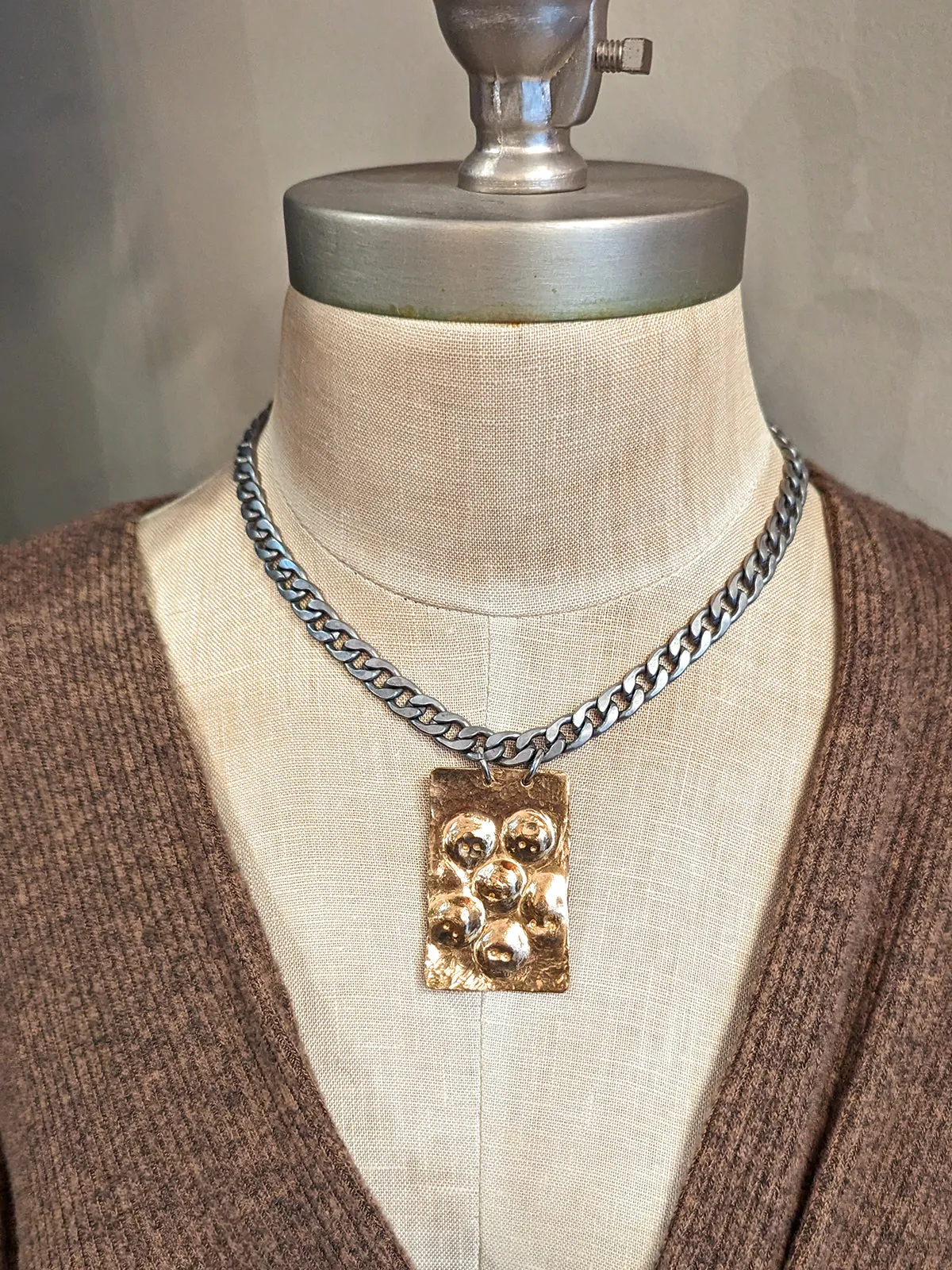 Dennis Higgins Emerging Skulls Pendant Necklace