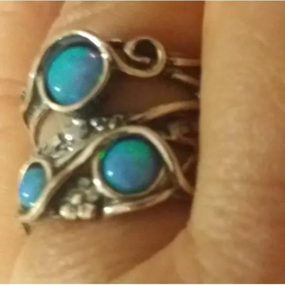 Sterling silver ring set with opal stones. Israeli designer bohemian ring