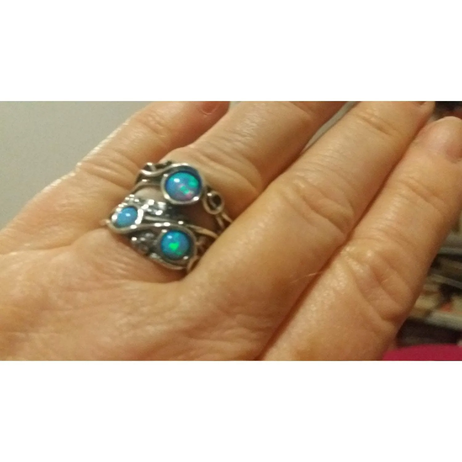 Sterling silver ring set with opal stones. Israeli designer bohemian ring